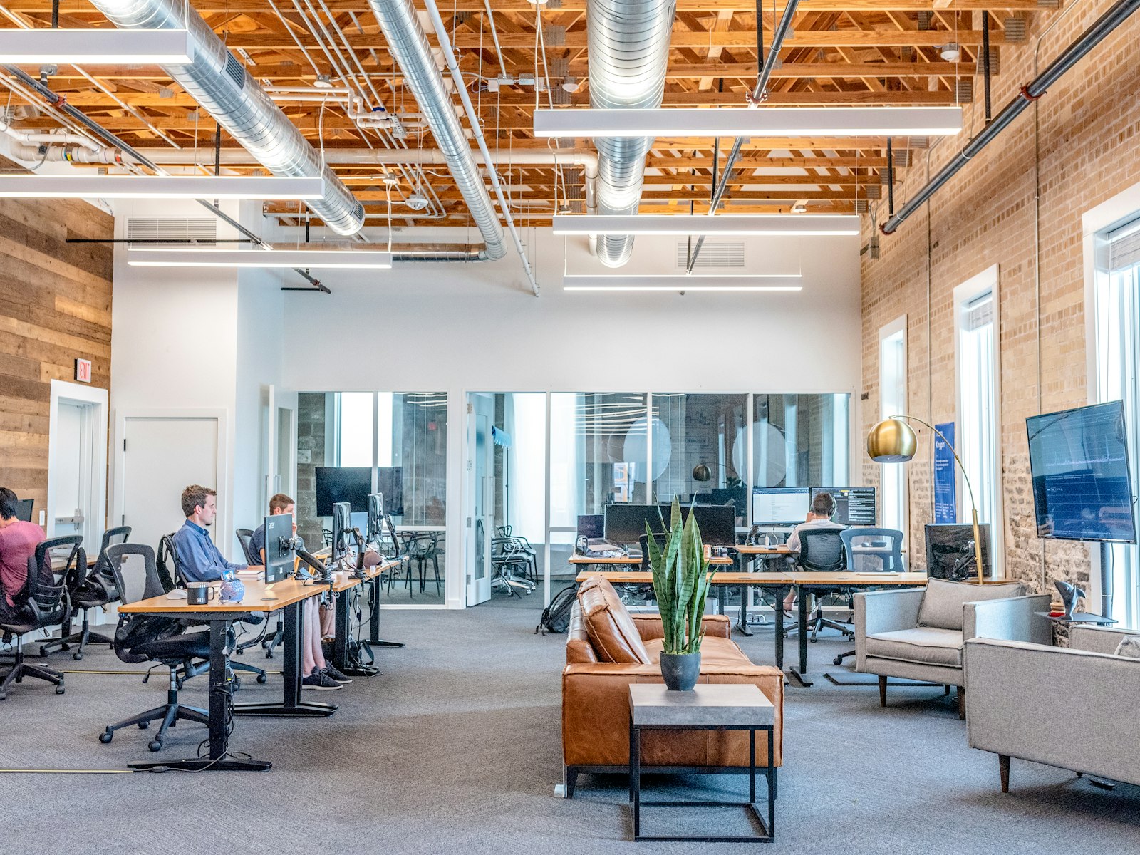 Colleagues talking in a modern office