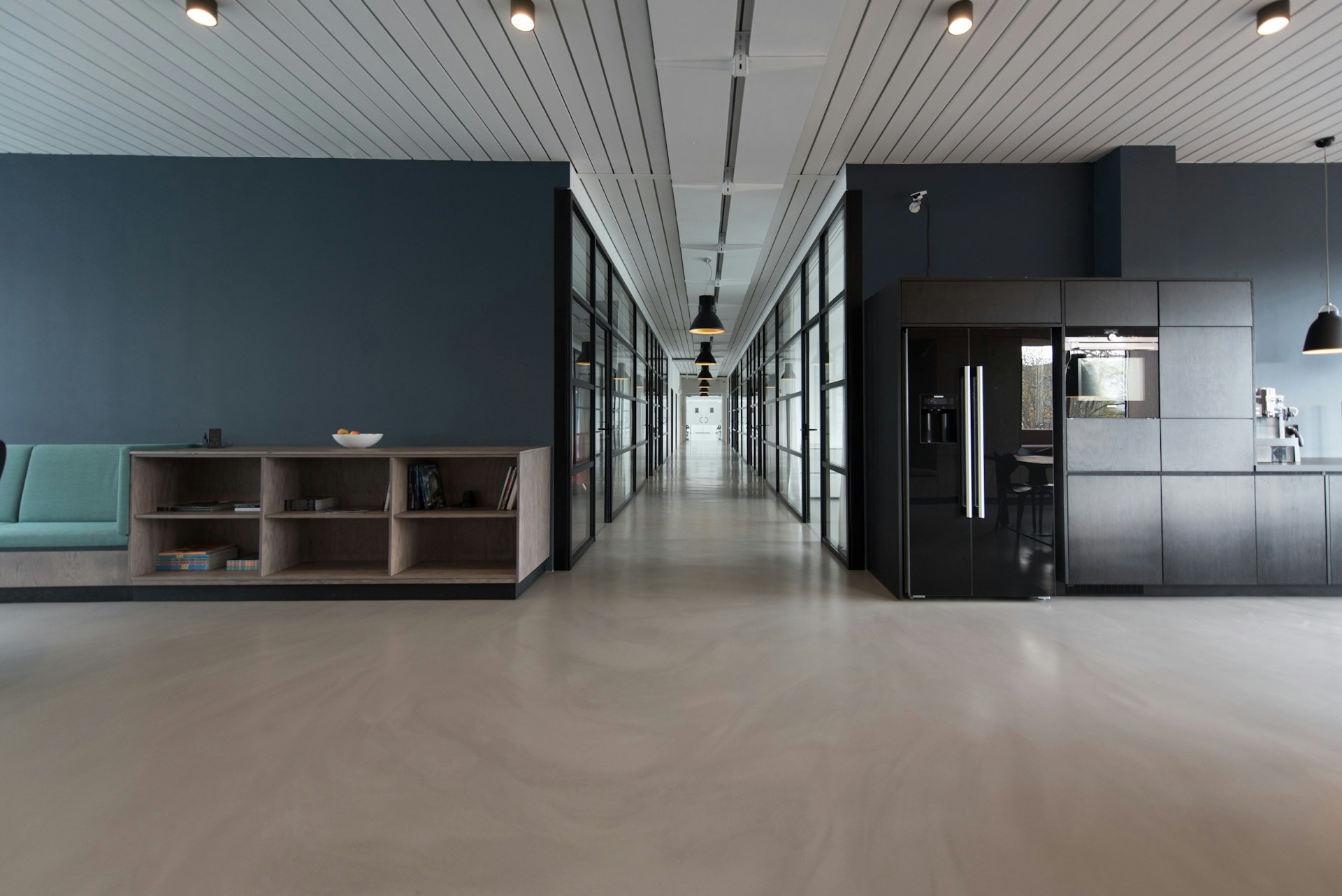 Open-plan office with desks and natural light